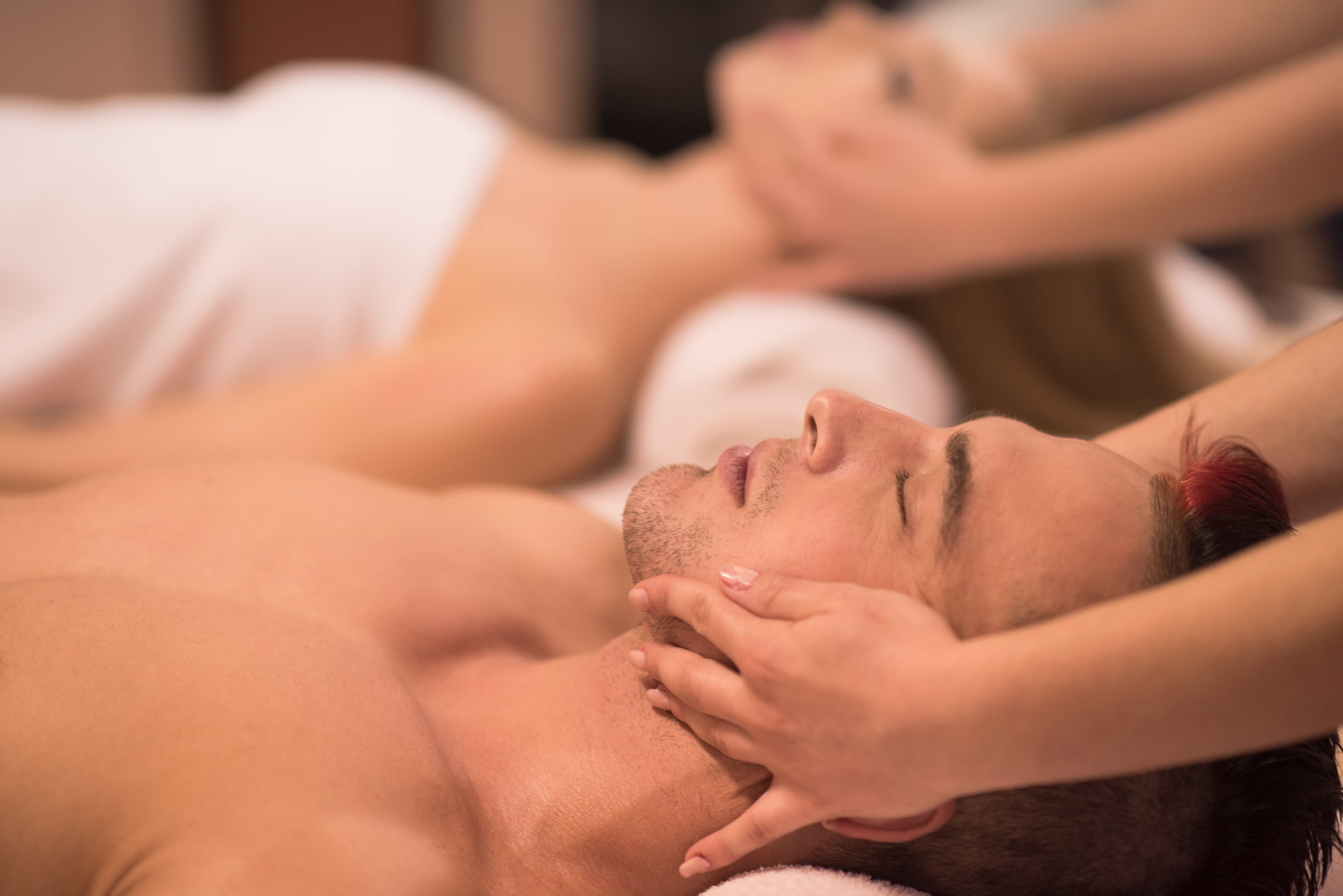 Couple Enjoying Head Massage 